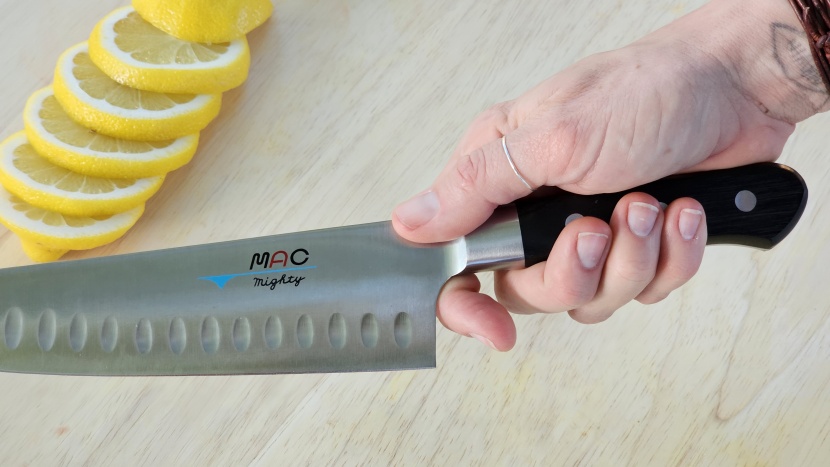 mac professional series 8&quot; with dimples mth-80 - the handle of the mac is much shorter than most chef knives. this...