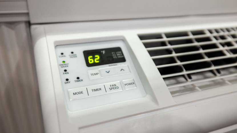 window air conditioner - cranking that cold air for immediate relief.
