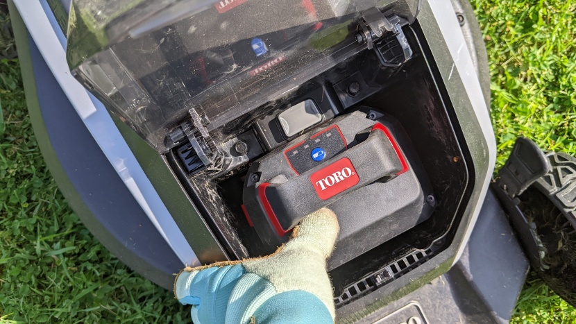 toro 60v max 21″ super recycler - placing or removing the battery is a straightforward affair. simply...