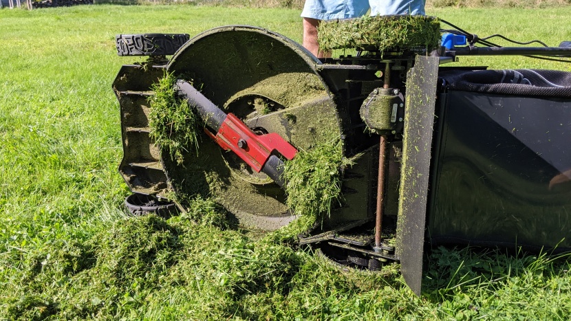 lawn mower - to switch out the blade on the max, lay it on its side and loosen...