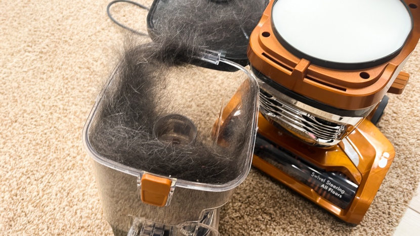 kenmore featherlite - this model did an exceptional job of cleaning pet hair from carpets.