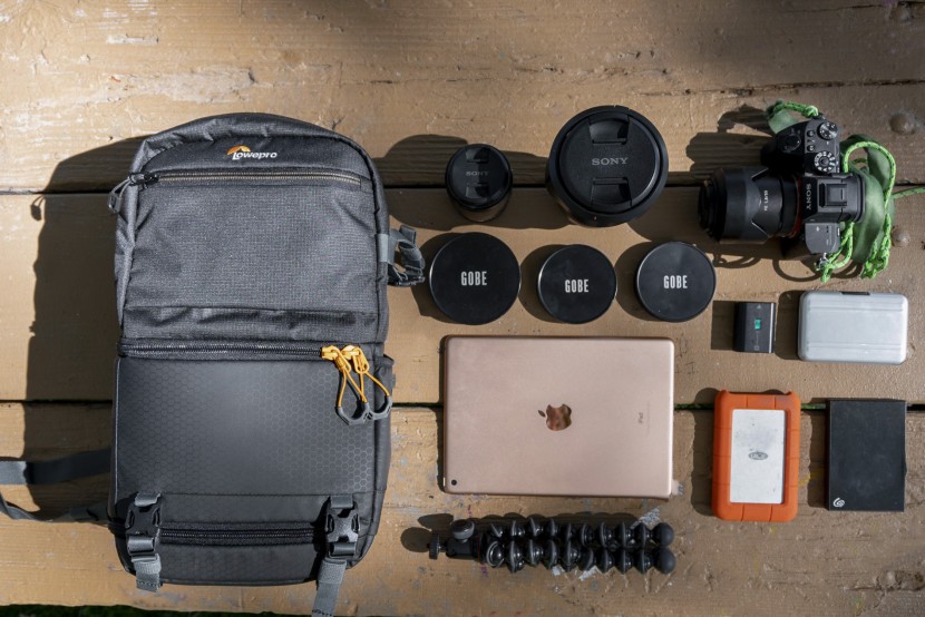 camera bag - the lowepro slingshot breaks the mold of a compact bag and just fits...