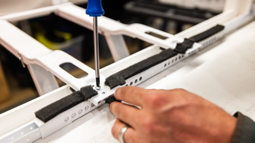 window air conditioner - foam strips placed early in installation block adjusting screws.