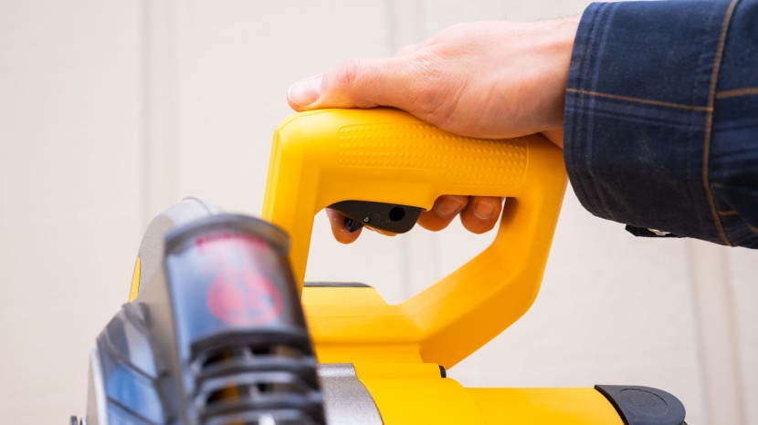 dewalt 12-inch single bevel compound dws715 - the safety button, trigger, and handle are designed to be ergonomic...