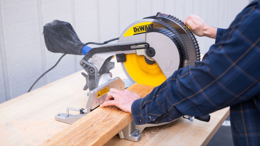 the dws715 has a vertical 90-degree cut depth of 8.1 inches.