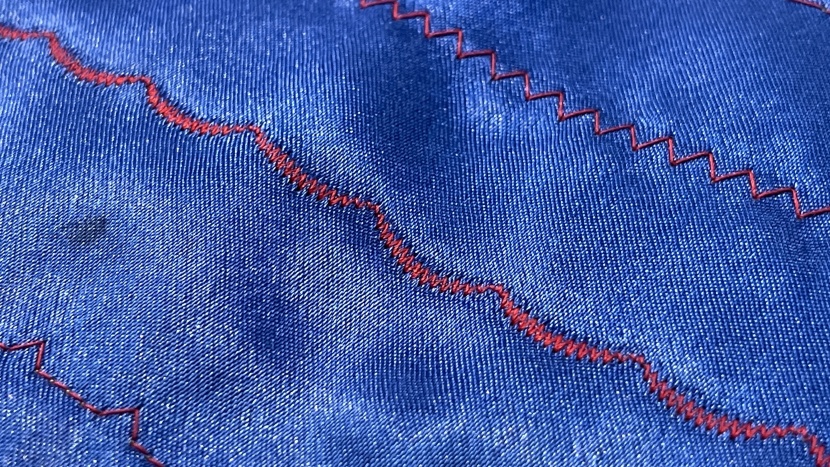 from the top, these scalloped stitches look great; they're evenly...