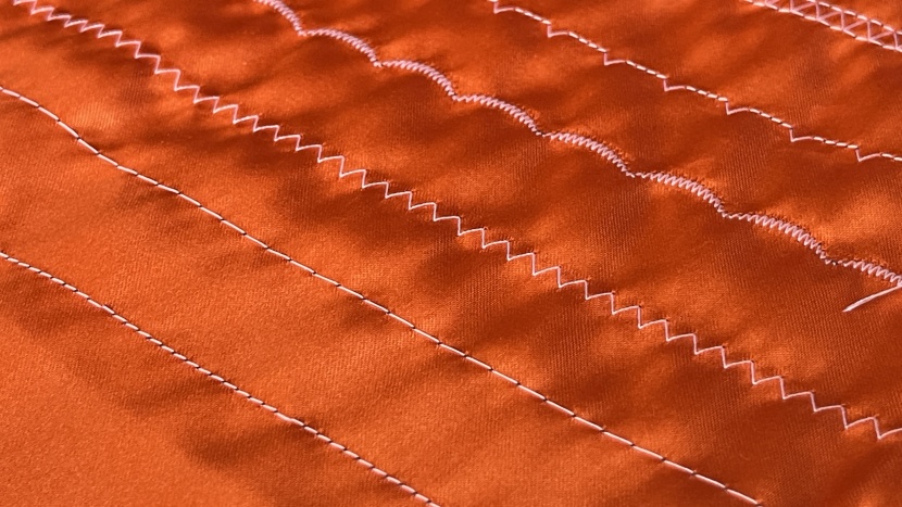 stitch samples on silk.