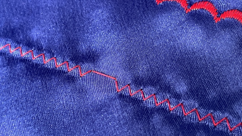 a dropped stitch in an otherwise beautiful zig-zag seam.
