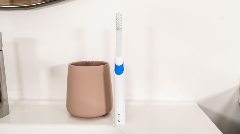 quip - the quip's slim case doubles as a countertop stand.