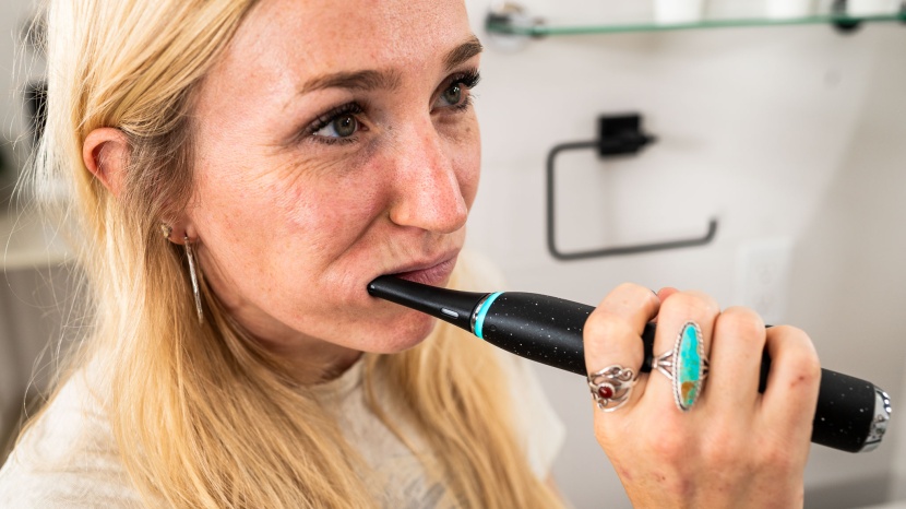 oral-b io series 10 - the green light indicates proper brushing pressure and is easy to...