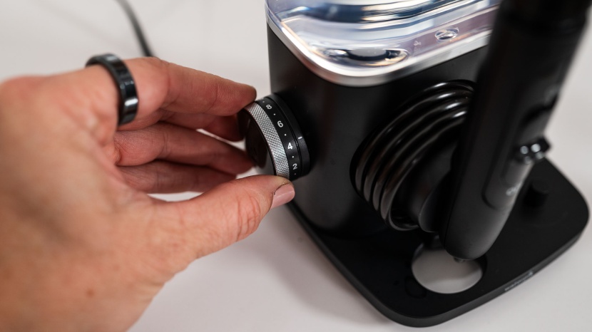 waterpik complete care 9.0 - a dial on the side of the flosser adjusts the intensity of the flow.