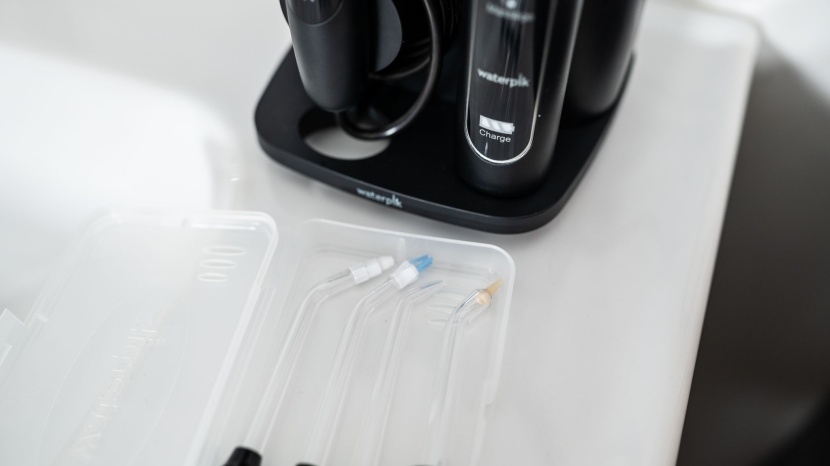 waterpik complete care 9.0 - the waterpik has a separate case for the five water flosser tips.