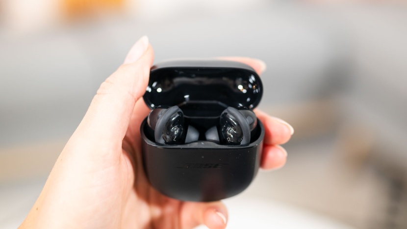 bose quietcomfort ii - these earbuds fit in their case with the stabilization wings...