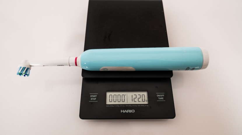 toothbrush - the oral-b pro 1000 being weighed for assessment.
