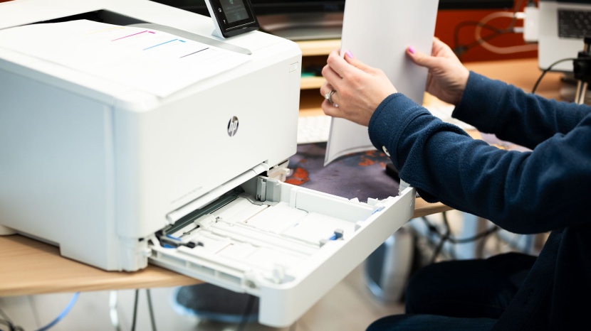 hp color laserjet pro m255dw - a large paper tray is located at the front of the unit and is easy...