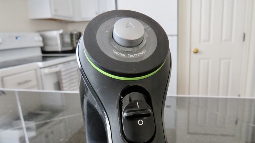 hand mixer - the spinning dial of the braun. a tiny green line indicates which...