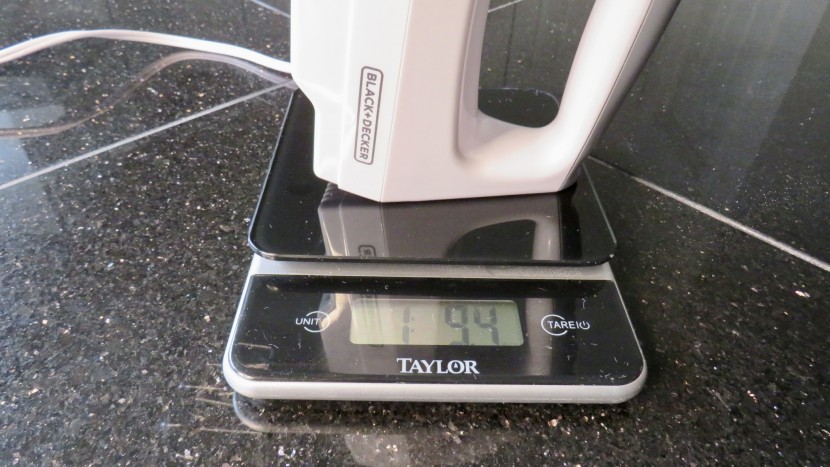 weighing the lightweight black+decker hand mixer.