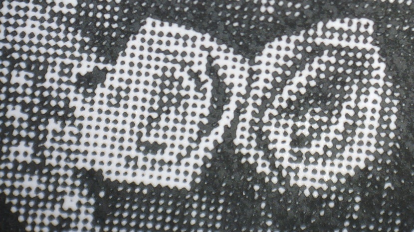 this printer produces photos that can barely be discerned.