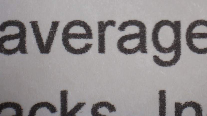 epson ecotank et-2800 - though the text is fairly clear from farther away, up close it looks...