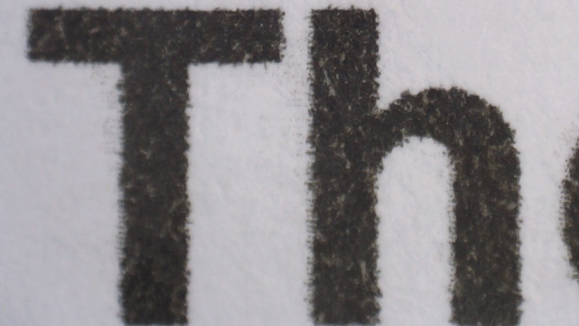 hp deskjet 4155e - text appears streaked and fuzzy up close.