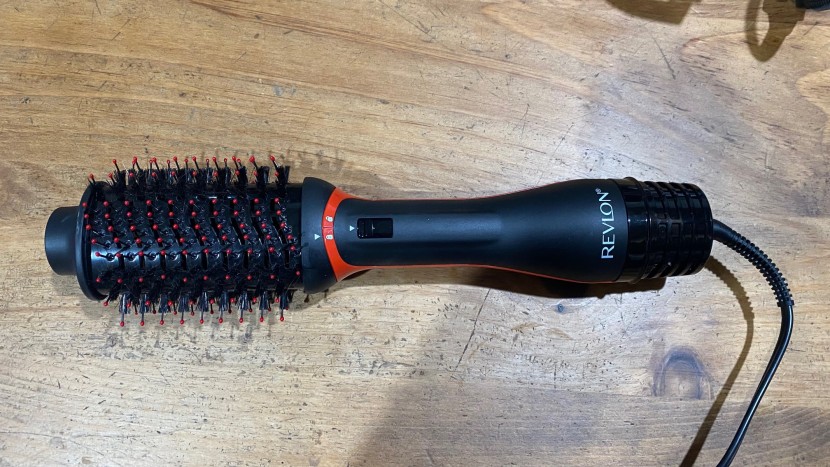 curling iron - the revlon one-step gave us volume with a sleek finish.