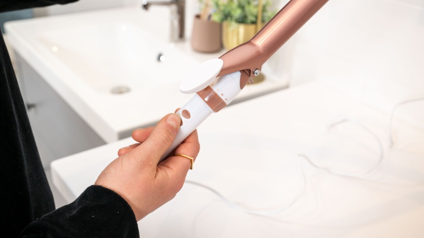 curling iron - the double ceramic is a simple curling iron that will get the job...