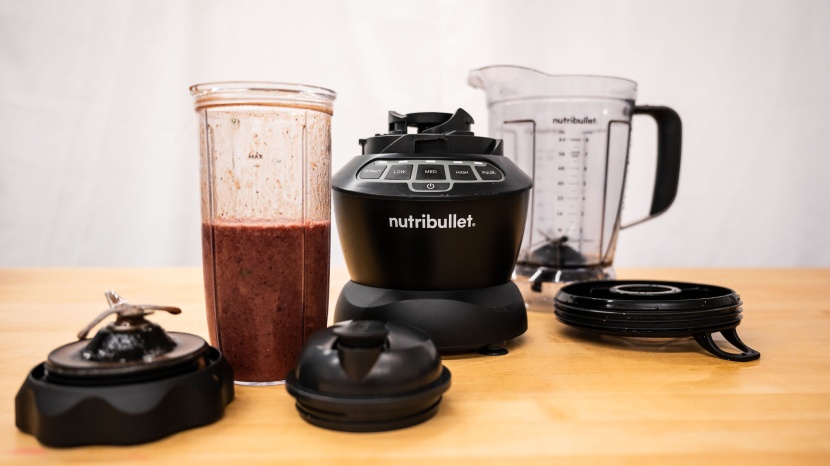 nutribullet combo - a separate blade attachment powers the 32-ounce to-go cup (front)...