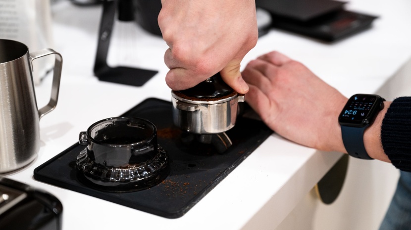 breville barista express - getting the tamping just right. the pre-infusion feature is also...