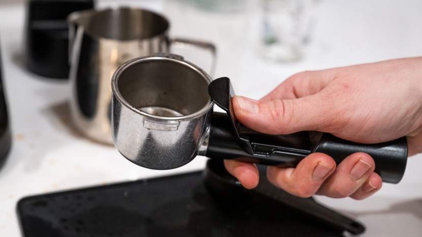mr. coffee 4-shot steam espresso - the portafilter handle comes equipped with a handy clip that keeps...