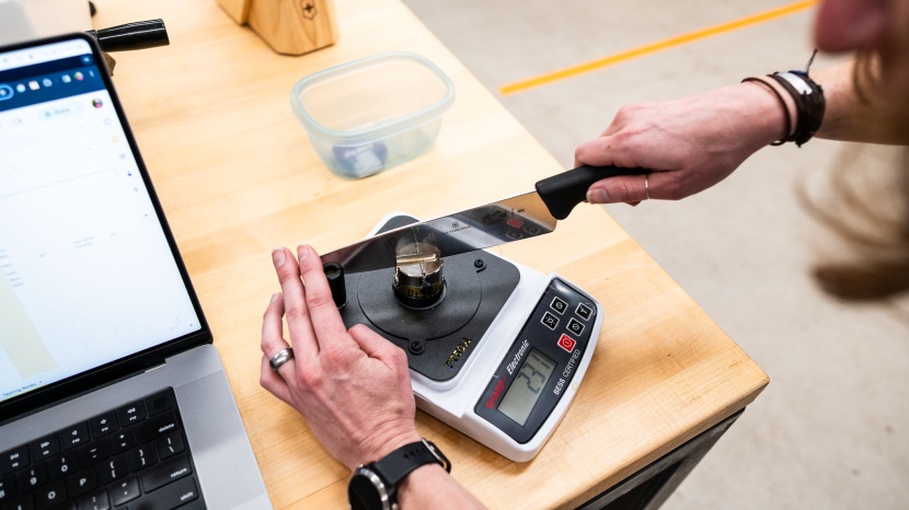 checking the sharpness of chef knife blades.