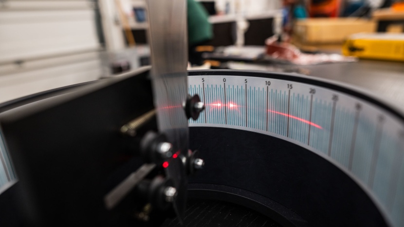 knife sharpener - the long, flat reflection of the laser off this knife sharpened by...