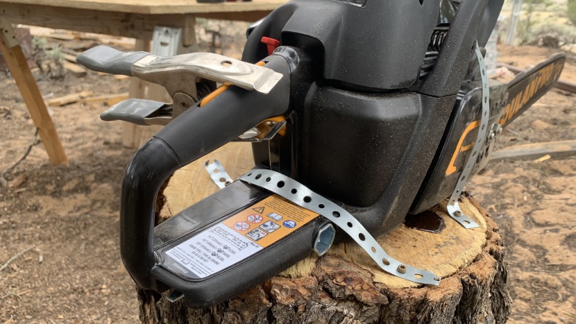 chainsaw - the chainsaws were securely fastened with metal straps during...