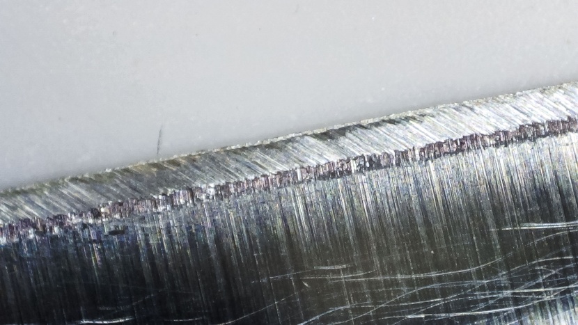 shown here under a microscope, the knife edge still had some burrs...