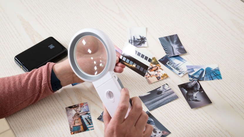 photo printer - we use a magnifying glass to closely evaluate clarity.