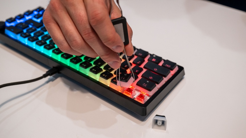 we inspect the fine details, replacing keycaps and switches, to find...