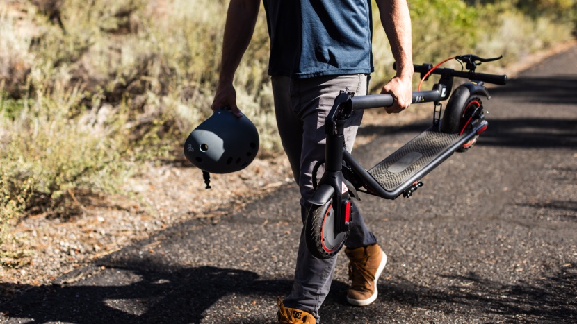 electric scooter - a scooter designed with portability and ergonomics in mind makes...