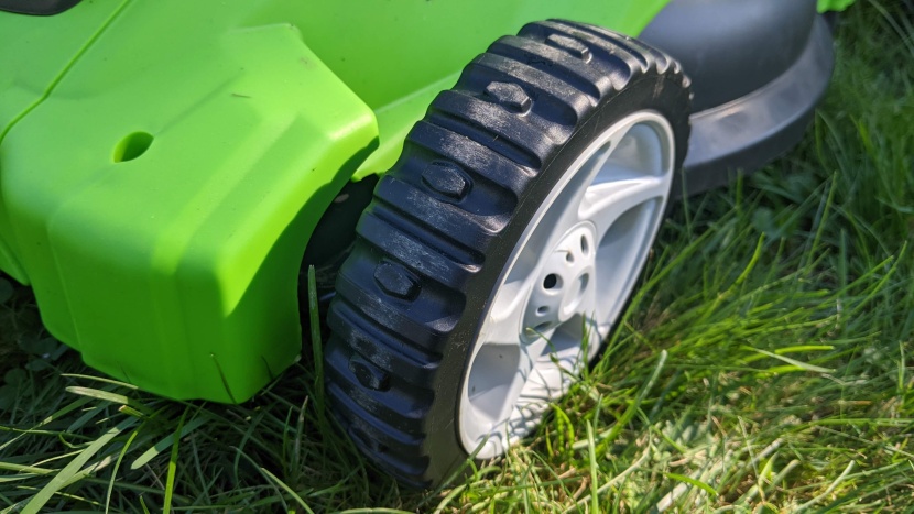 greenworks 25322 - the plastic tires don't give you much traction, but you don't need...