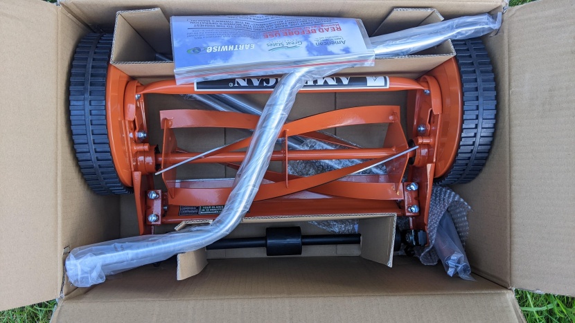 the lawn mower arrives disassembled, but the process to put it...