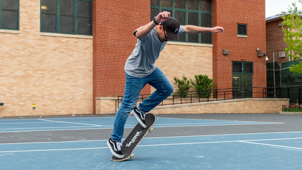 skateboard - jackson popping a backside 180 on the whitefang double kick.