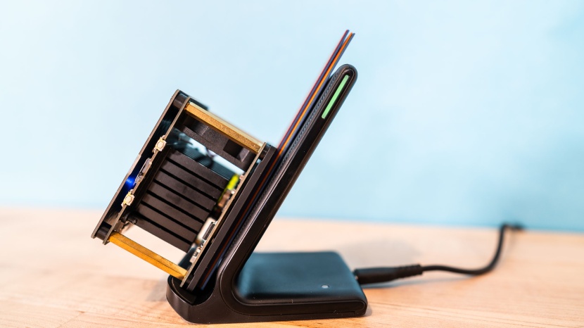 charger - in addition to holding a phone upright for easy viewing (it works in...