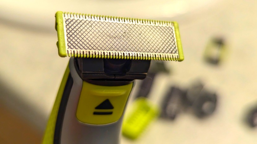 philips norelco oneblade 360 face + body - a close up of the cutting head (3/8 inches tall and 1 1/4 inches...