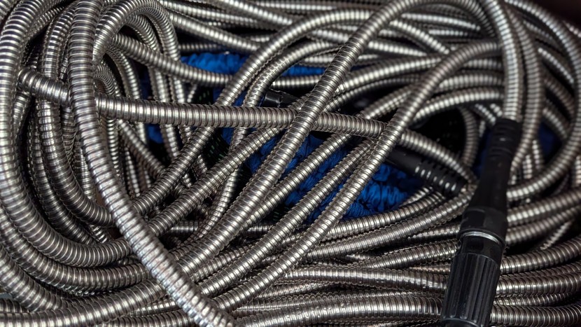garden hose - this slippery hose is challenging to keep tidy when not in use.