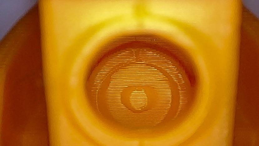 3d printer - a view through a benchy porthole. (elegoo neptune 4 pro)