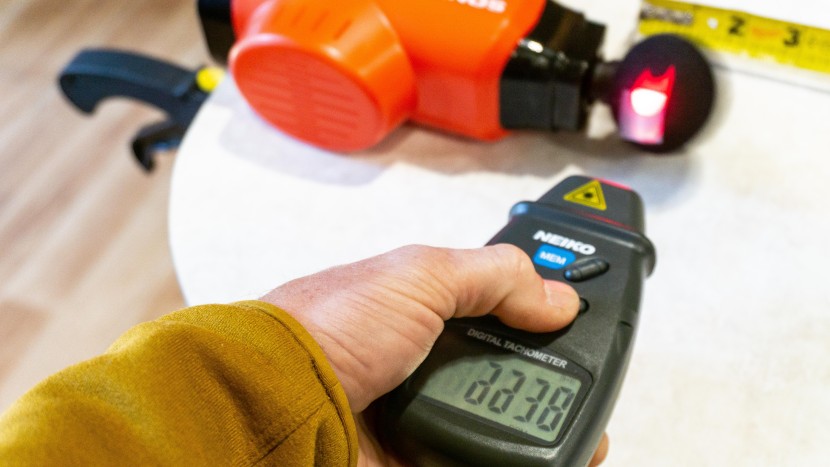 massage gun - we utilized a tachometer to assess the percussions per minute of...