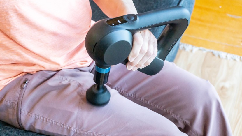 massage gun - triangle massagers offer multiple holding positions.