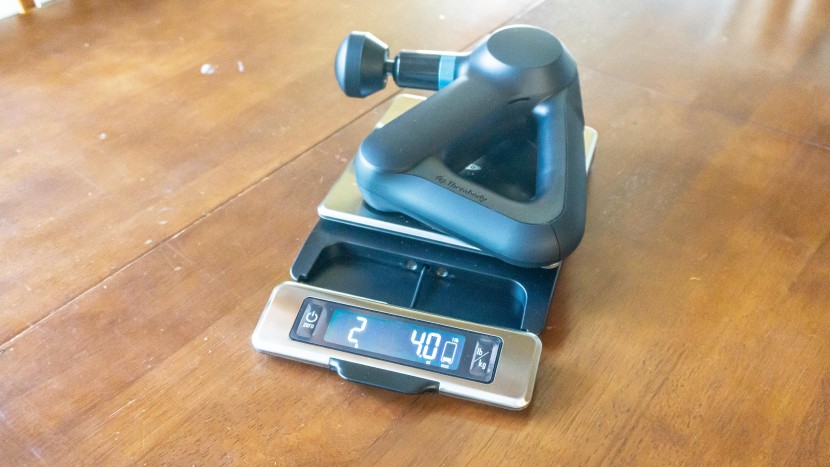 massage gun - when considering its capabilities, the 2.25-pound (2 lbs, 4 oz)...