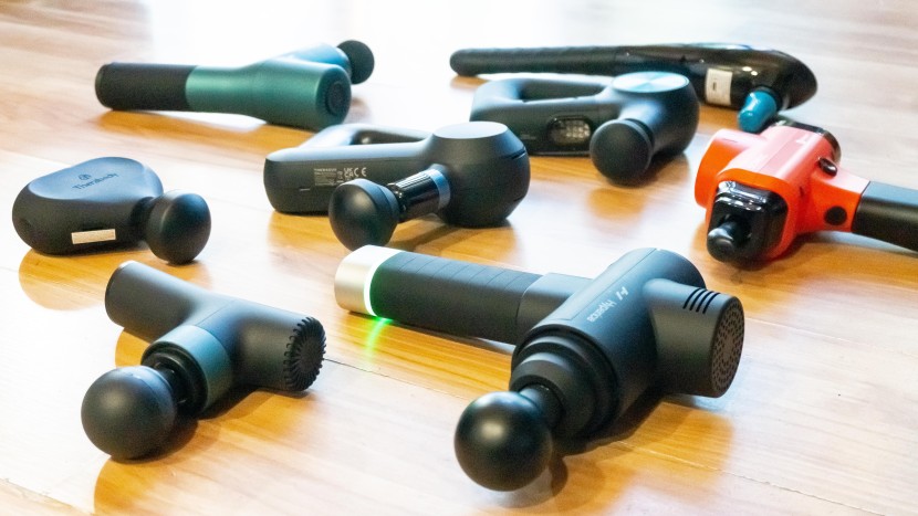 massage gun - muscle massage guns come in all sorts of shapes, including the...