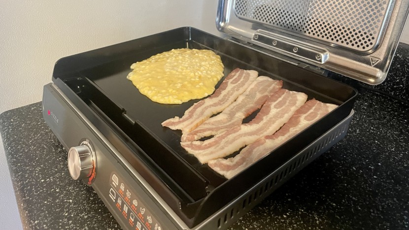 ninja sizzle - a large grease channel and slight tilt to the griddle overall help...