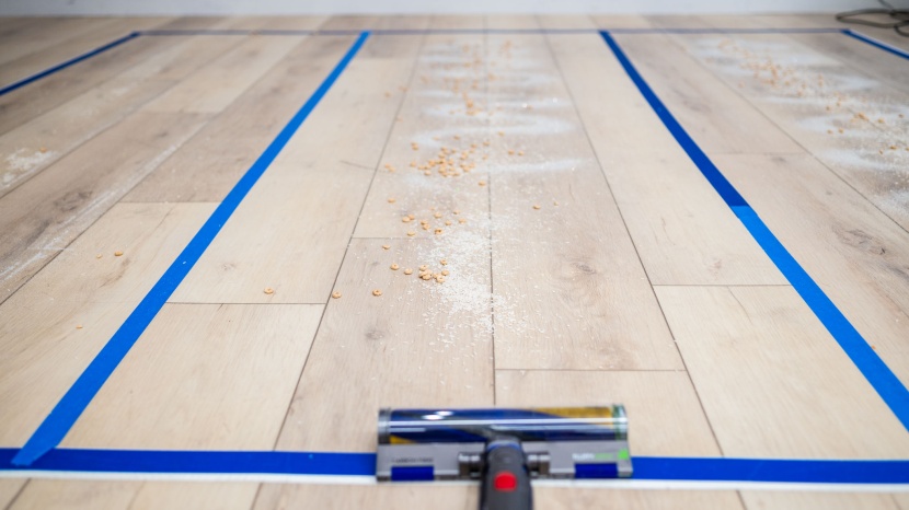 dyson v15 detect - we spread a mix of material over a 27-square-foot section of...