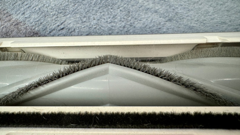 tineco pure one s11 - the brush roll features stiff bristles that are very effective on...